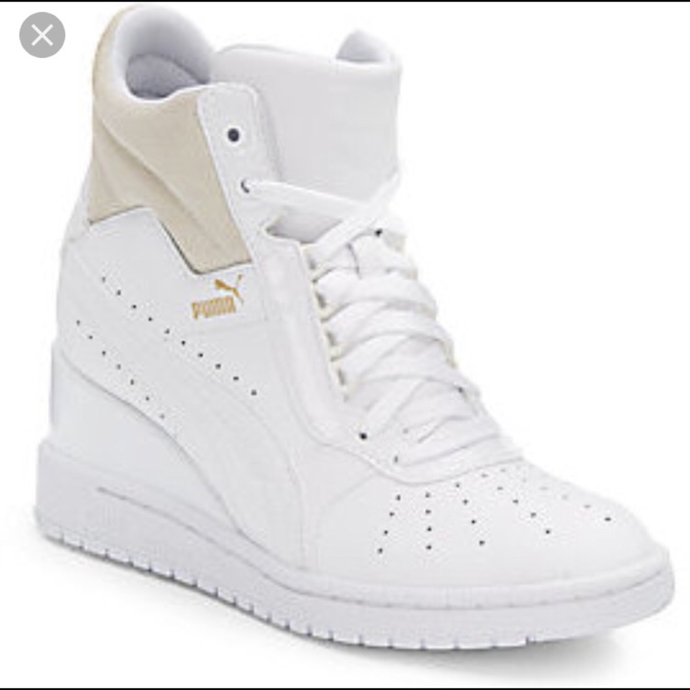 Woman’s high top puma advantage wedge sneakers